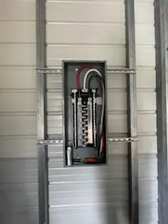 Electrical panel installation in the Asheville area: a clean, code-compliant subpanel setup ready to power this new metal building reliably for years to come